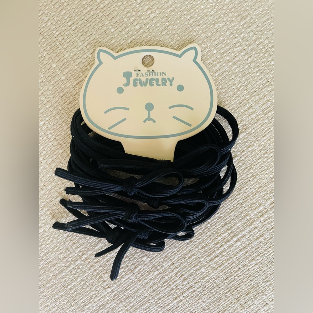 New Hair Ties or Bracelets. Black in color. 6 total pieces.